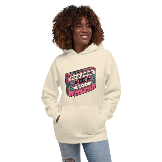 Person wearing a cream hoodie with a pink cassette tape design on a white background
