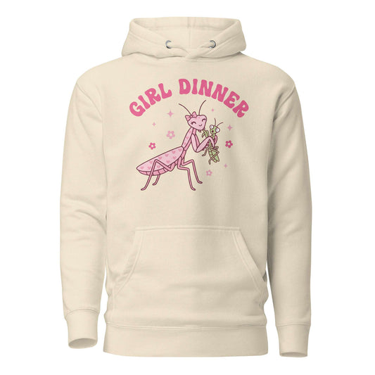 Beige hoodie with pink praying mantis graphic and 'Girl Dinner' text on a white background