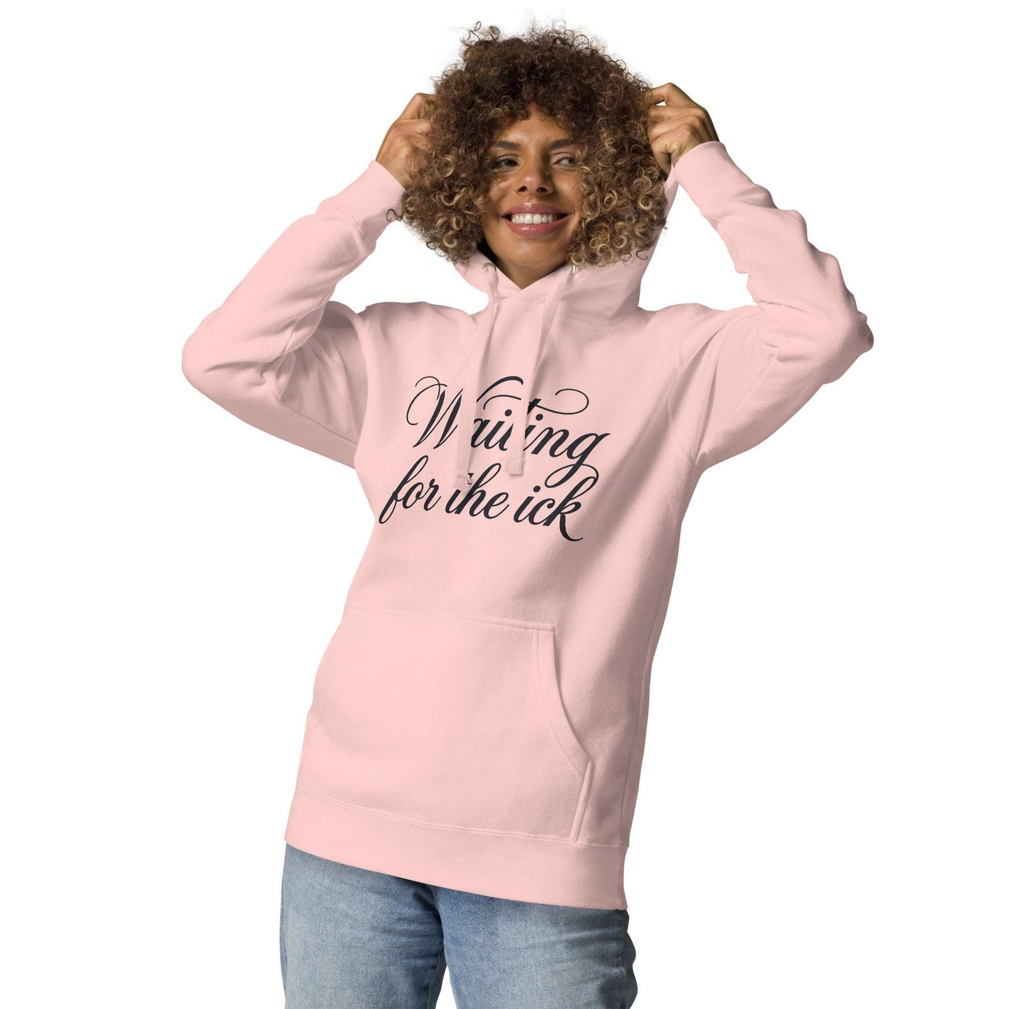 Person wearing a pink hoodie with 'Mermaid Wear' logo on a white background