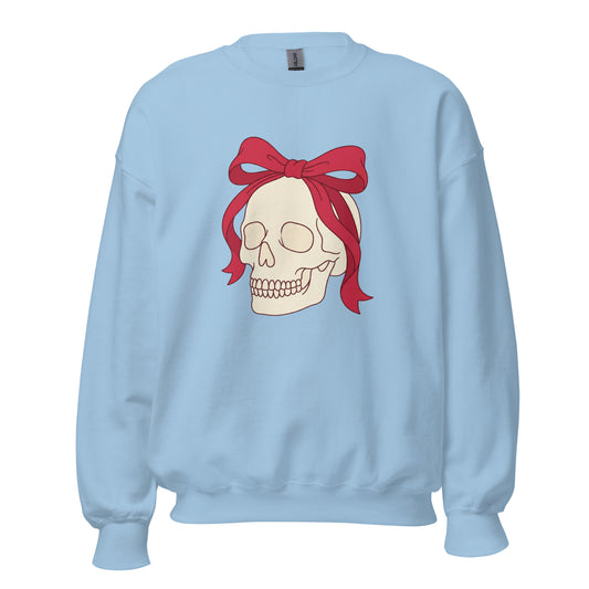Light blue sweatshirt with a skull design with red hair and a bow on a white background