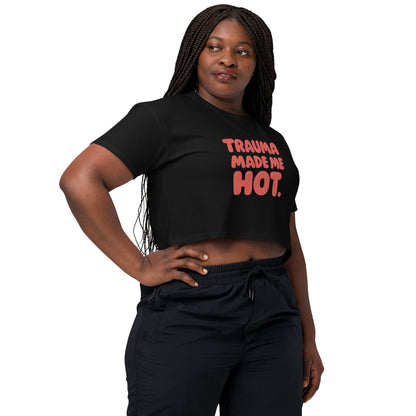 Person wearing a black t-shirt with a graphic design on a white background