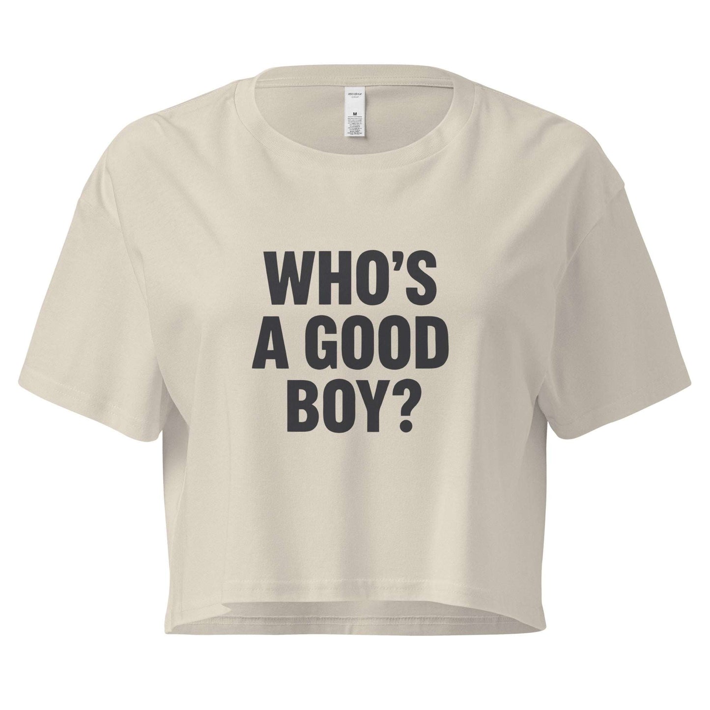 Beige crop top with 'WHO'S A GOOD BOY?' text on a white background