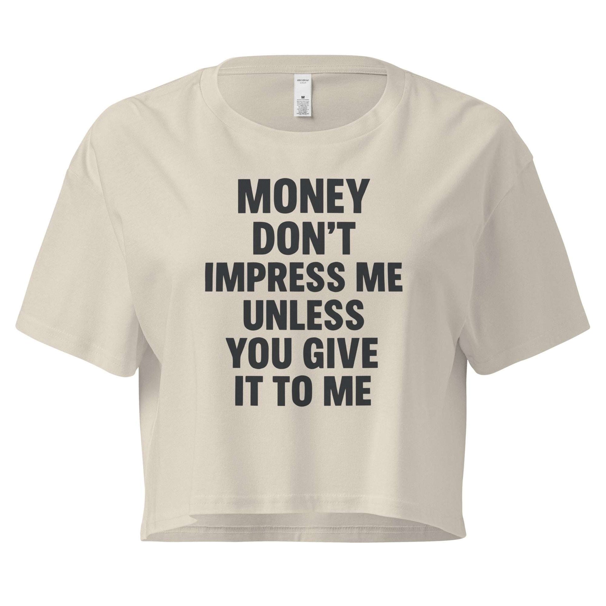 Beige crop top with black text on a white background