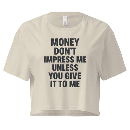 Beige crop top with black text on a white background