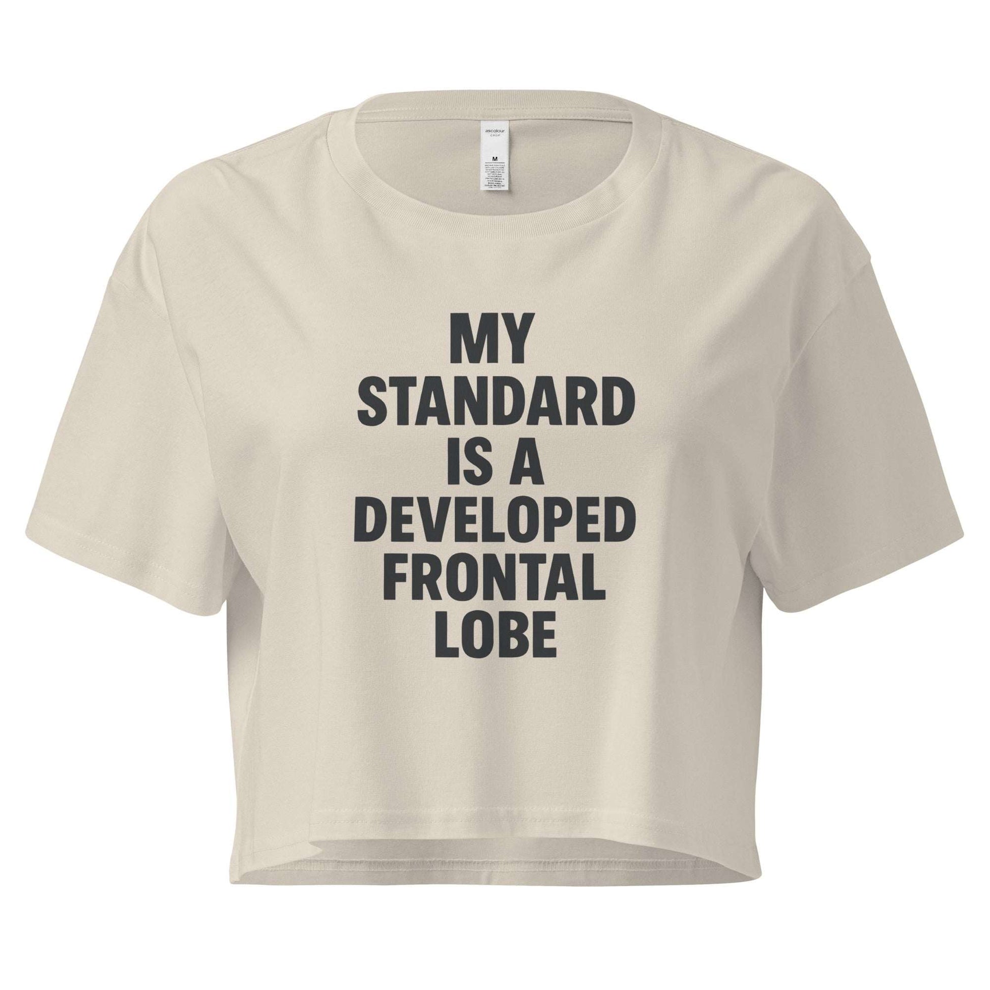 Beige crop top with black text on a white background