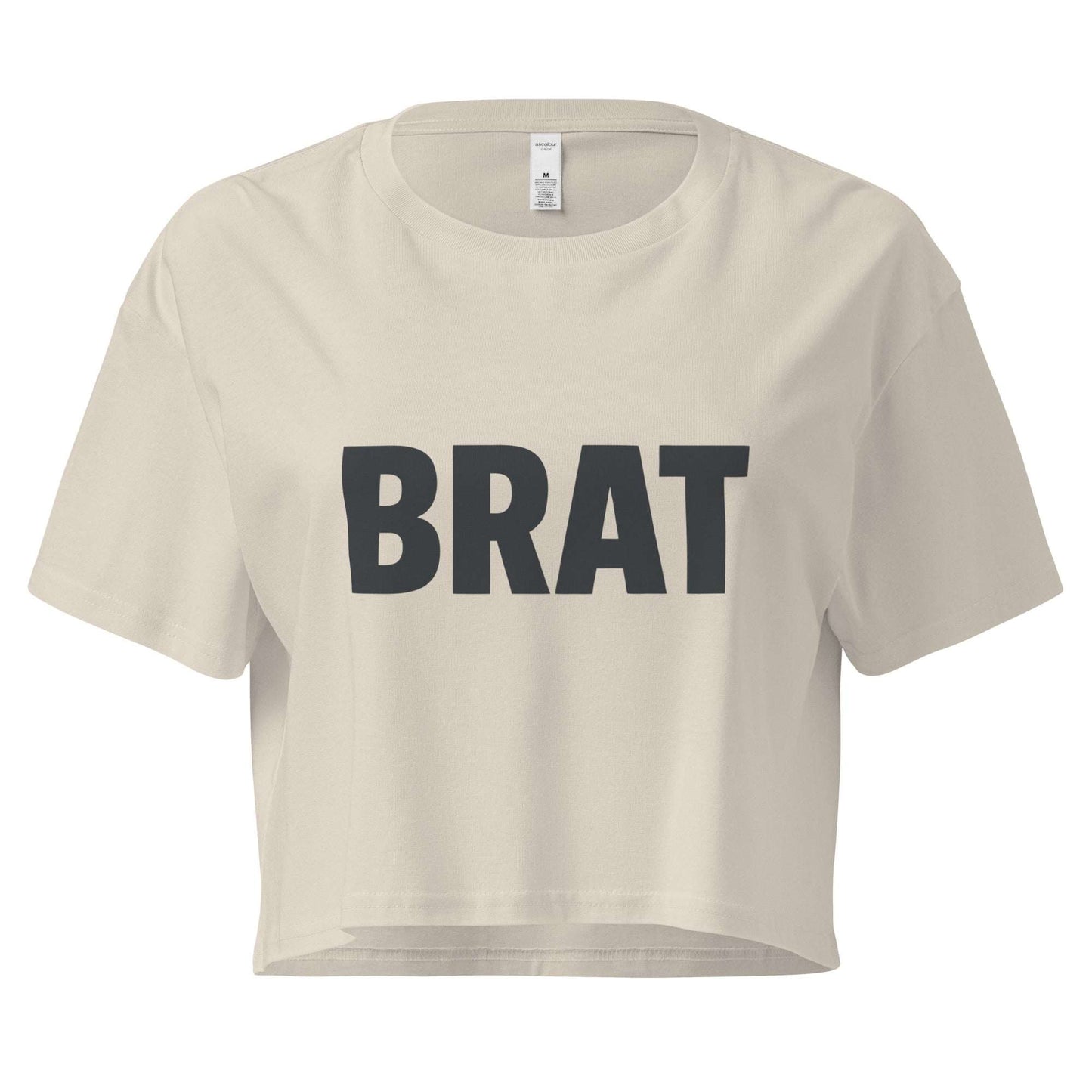 Beige crop top with 'BRAT' text on a white background