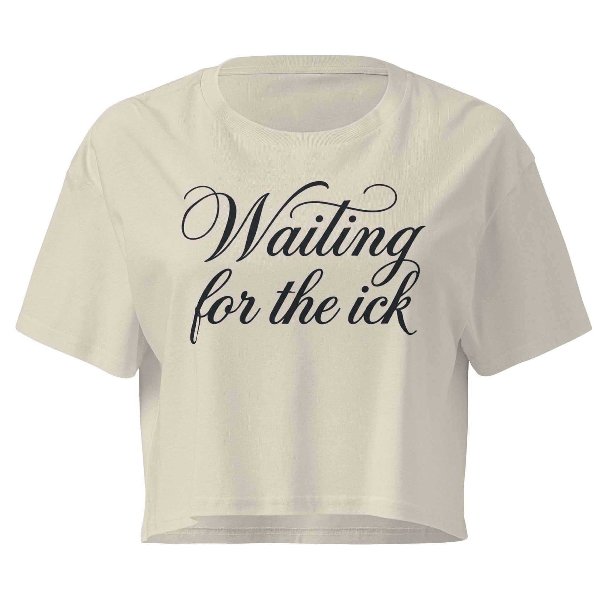 Beige crop top with black text 'Waiting for the ick' on a white background
