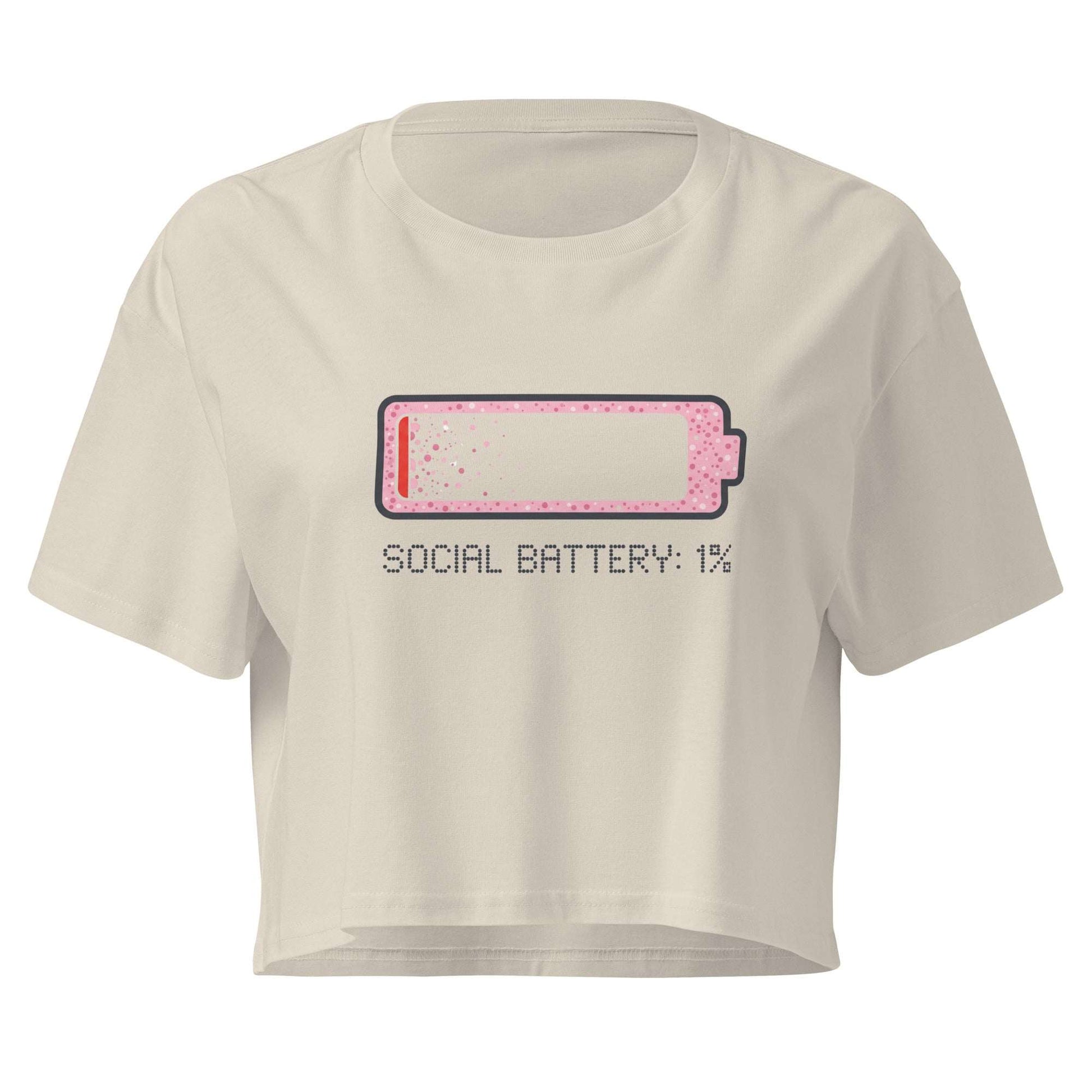 Beige crop top with a graphic of a battery icon and text 'SOCIAL BATTERY: 1%' on a white background