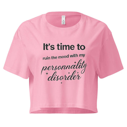 Pink t-shirt with black text on a white background