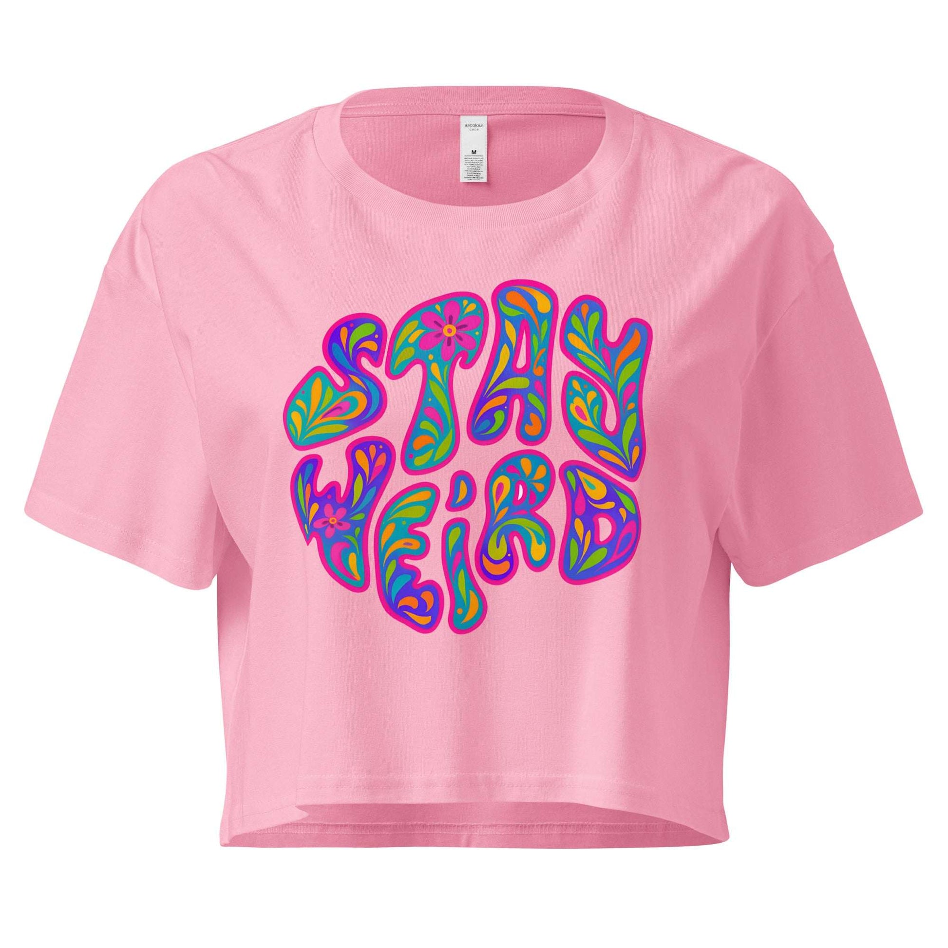 Pink crop top with 'Stay Weird' graphic design on a white background