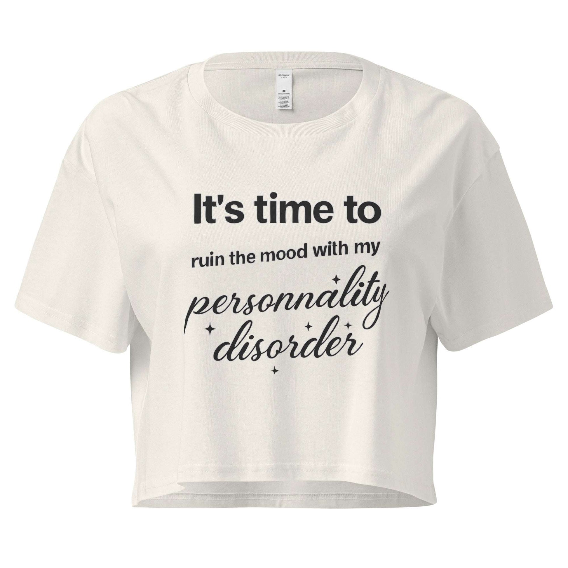 Women’s ecru loose crop top featuring 'It's time to ruin the mood with my personality disorder' text in black cursive