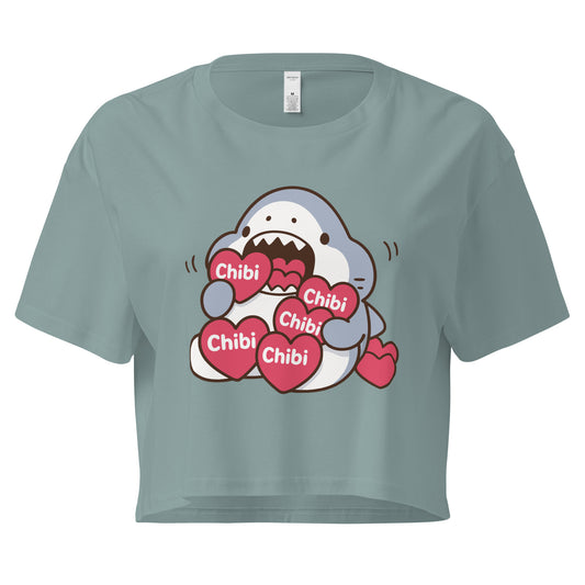 Green t-shirt with a cartoon shark design holding hearts and the word 'Chibi' on a white background.