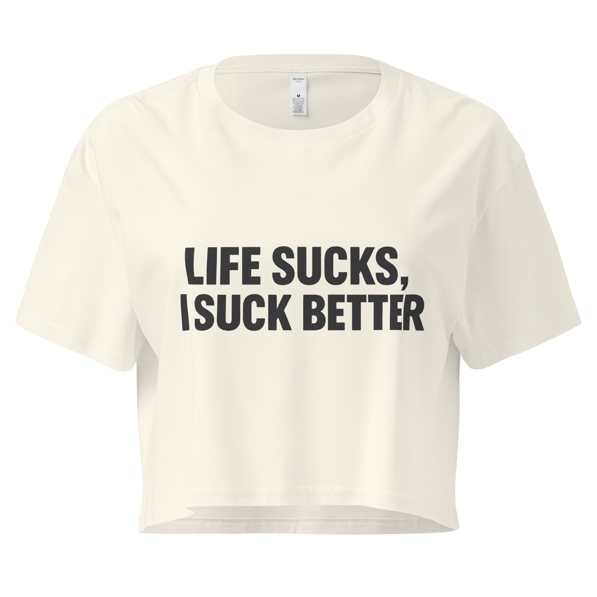 White crop top with black text 'LIFE SUCKS, I SUCK BETTER' on a white background