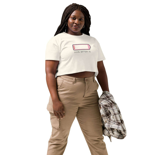 Person wearing a white t-shirt with 'P.A.H.' text and beige pants on a white background