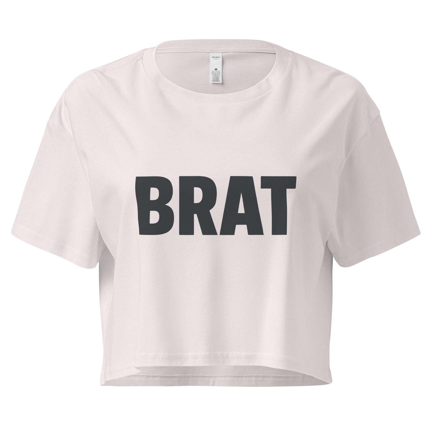 White crop top with 'BRAT' printed in black on a white background
