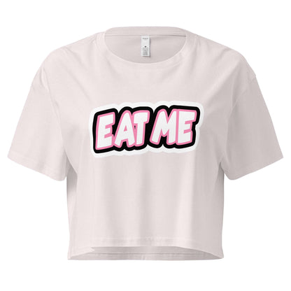 White crop top with 'EAT ME' text on a white background