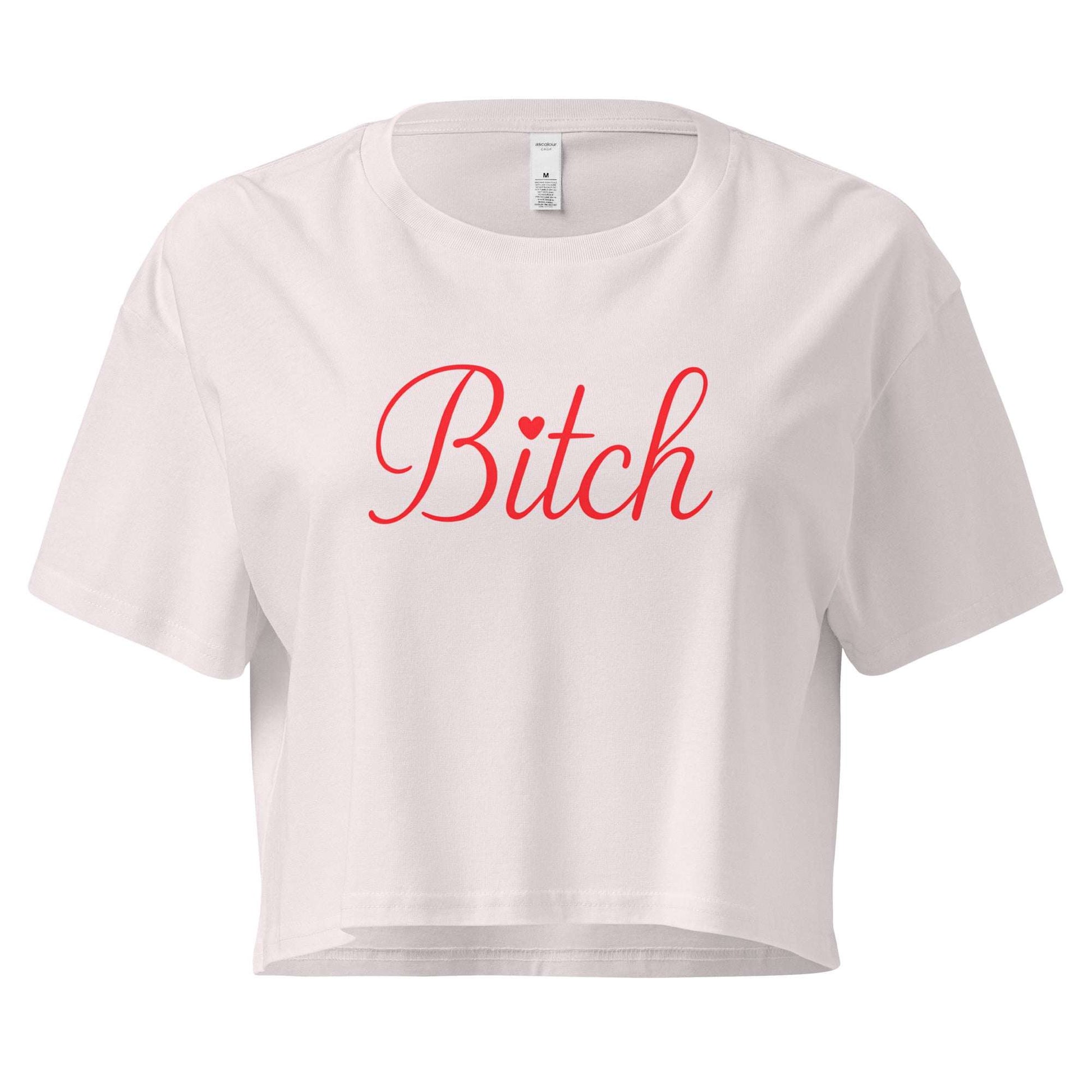 White crop top with 'Bitch' printed in red on a white background