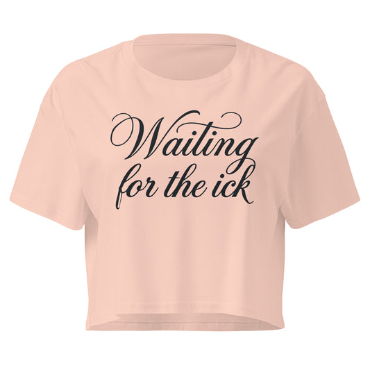 Pink crop top with 'Waiting for the ick' text on a white background
