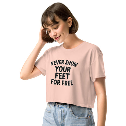 Woman wearing a light pink t-shirt with a colorful butterfly design on a white background