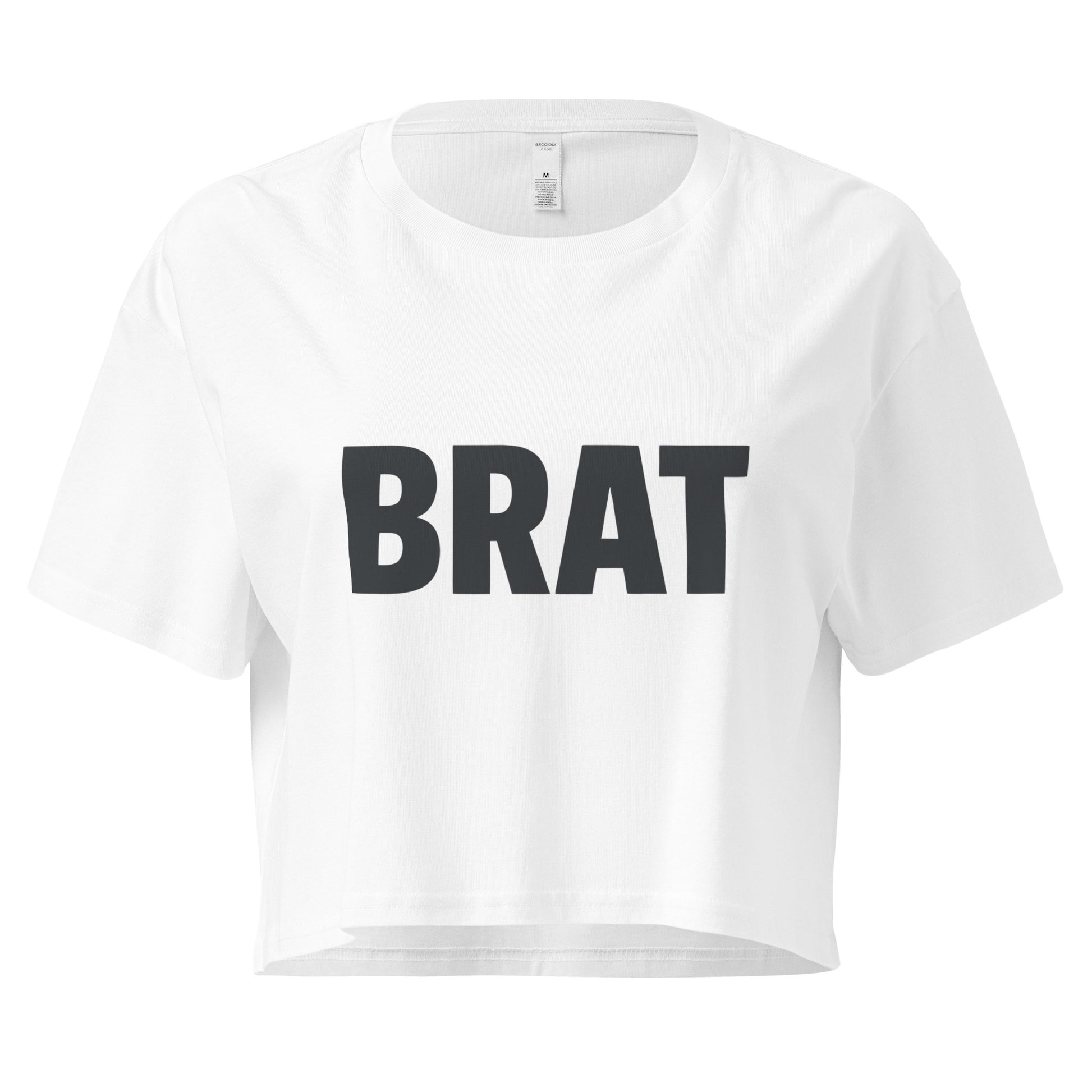 White crop top with 'BRAT' printed in black on a white background